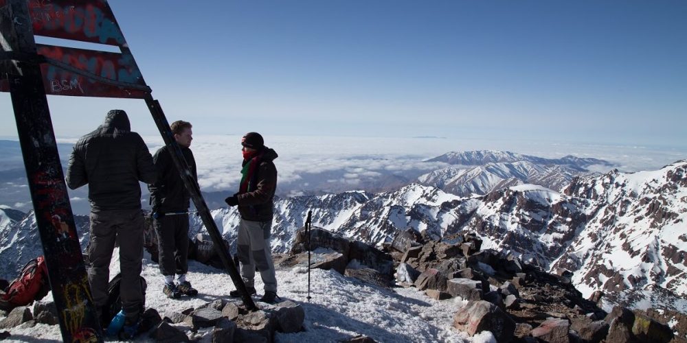 people at the summit of mount toubkal